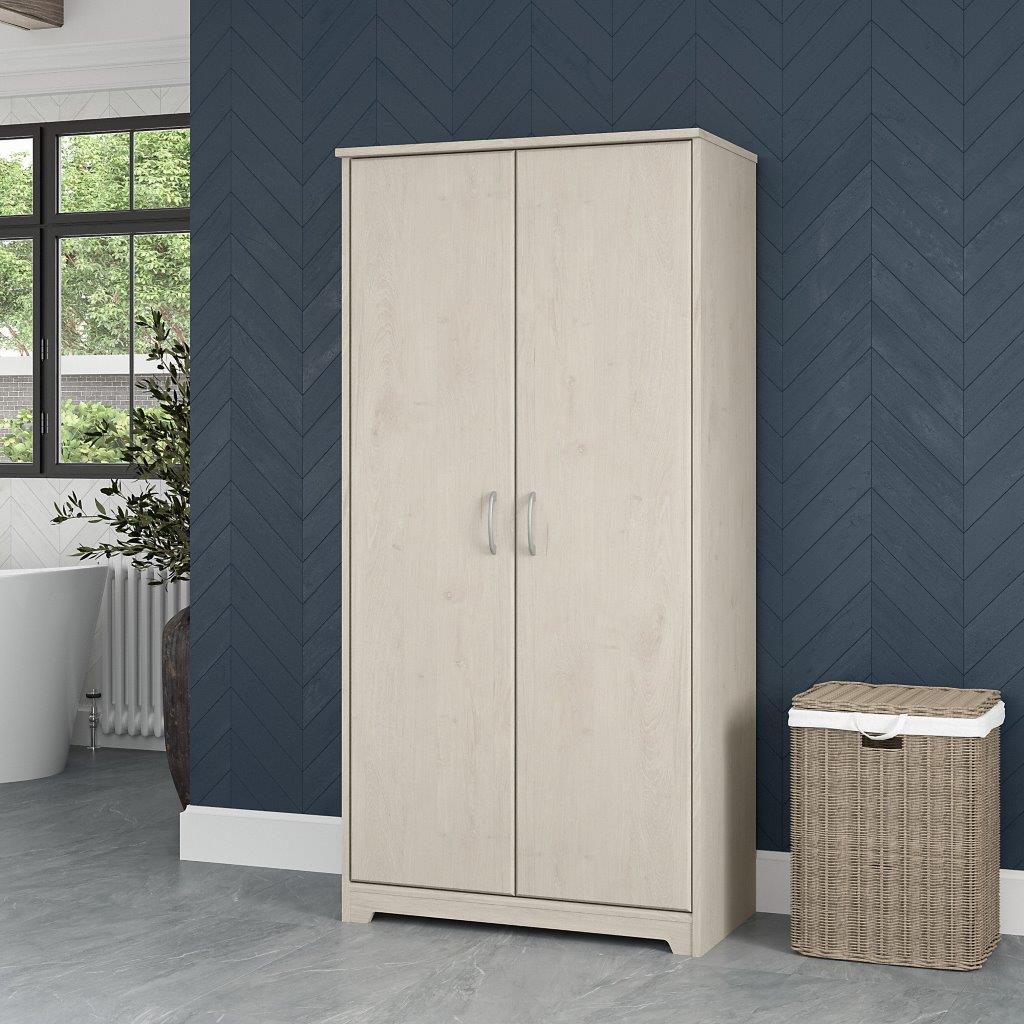 https://cdn.1stopbedrooms.com/media/catalog/product/b/u/bush-furniture-cabot-tall-bathroom-storage-cabinet-with-doors-in-linen-white-oak_qb13410343.jpg