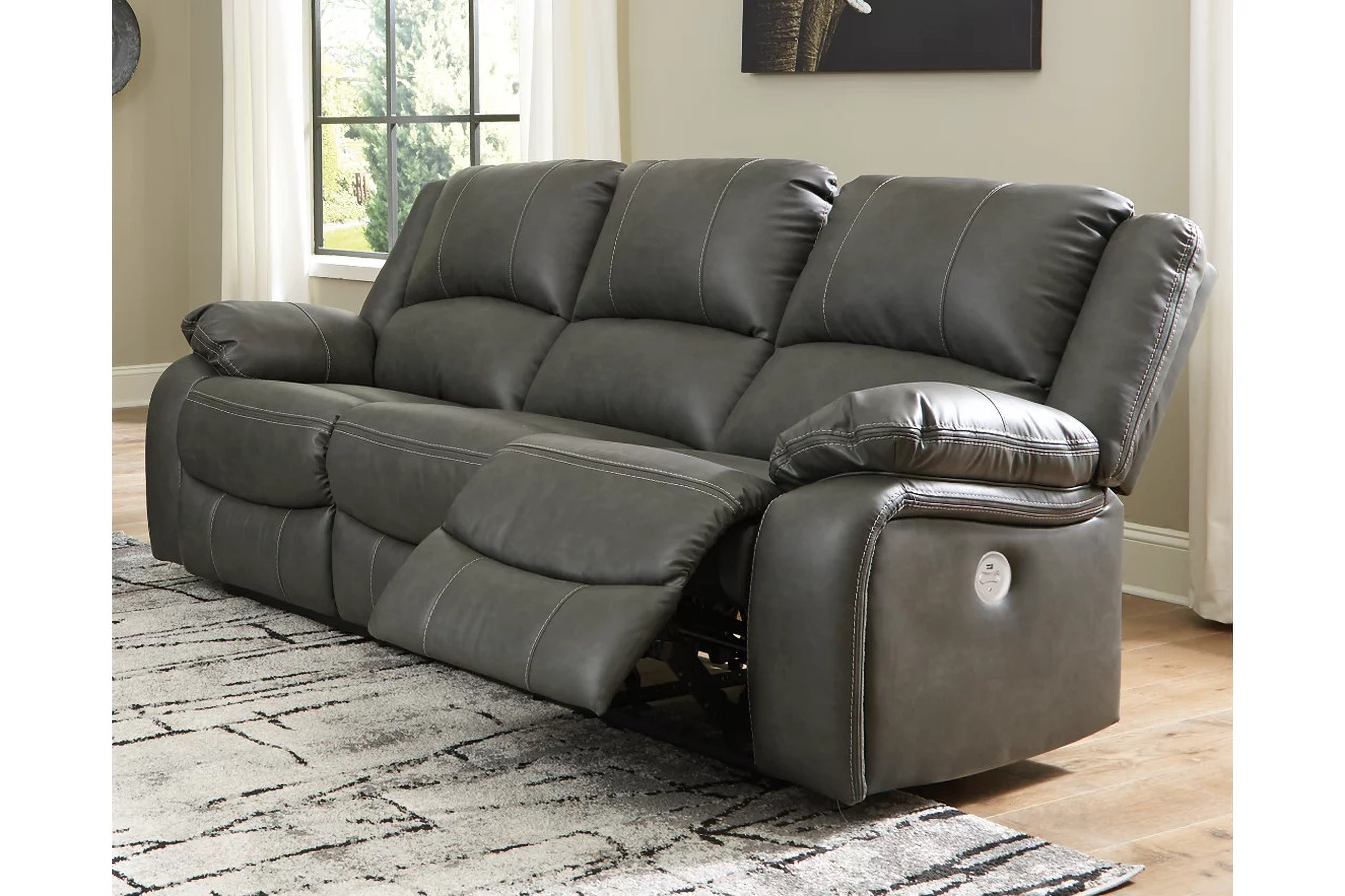 https://cdn.1stopbedrooms.com/media/catalog/product/c/a/calderwell-power-reclining-sofa-in-gray_qb13383690_23.jpg