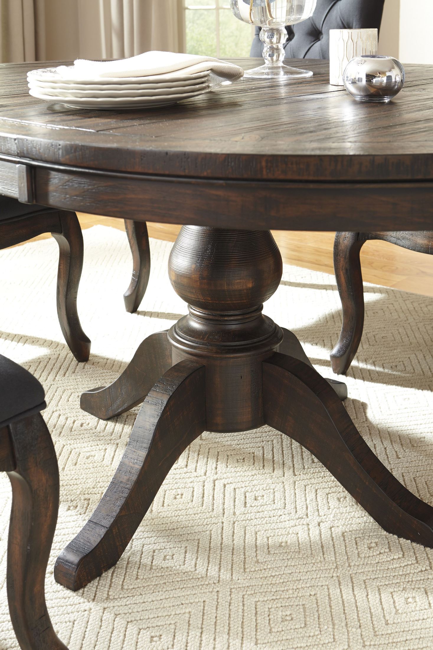 Signature Design By Ashley Trudell Dark Brown Round Extendable Trudell Dark Brown Round Extendable Pedestal Dining Table