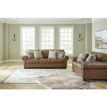 Carianna Living Room Set In Caramel
