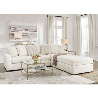 Chessington 2-Piece Sectional and Ottoman In Ivory