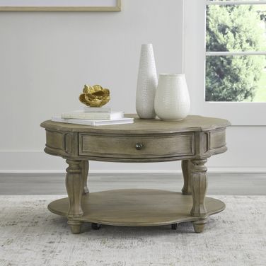Magnolia Manor Round Cocktail Table In Weathered Bisque