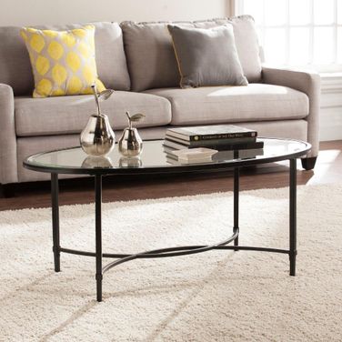 Quinton Metal And Glass Oval Cocktail Table In Black