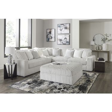 Stupendous 3-Piece Sectional and Ottoman In Alloy