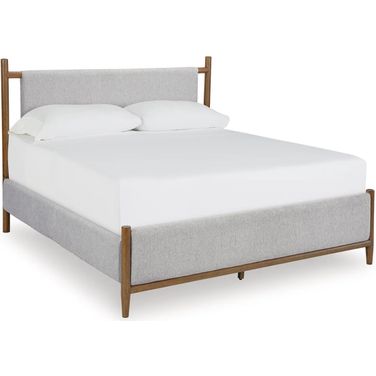 Lyncott California King Upholstered Bed In Brown