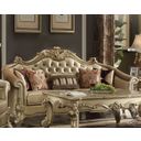 The appearance of Vendome Ii Bone Gold Patina Sofa designed by ACME in the rustic / southwestern interior design. This gold piece of furniture  was selected by 1StopBedrooms from Vendome Ii Collection to add a touch of cosiness and style into your home. Sku: 53120. Material: Faux Leather. Key Features: Tufted.