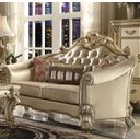 The appearance of Vendome Ii Bone Gold Patina Loveseat designed by ACME in the rustic / southwestern interior design. This gold piece of furniture  was selected by 1StopBedrooms from Vendome Ii Collection to add a touch of cosiness and style into your home. Sku: 53121. Material: Faux Leather. Key Features: Tufted.