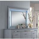 The appearance of Lillian Mirror designed by Crown Mark in the modern / contemporary interior design. This silver piece of furniture  was selected by 1StopBedrooms from Lillian Collection to add a touch of cosiness and style into your home. Sku: B7100-11. Material: Wood.