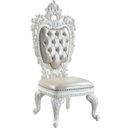 The appearance of Acme Vanaheim Side Chair Set Of 2 In Beige Pu And Antique White Finish designed by ACME in the transitional interior design. This antique white piece of furniture was selected by 1StopBedrooms from Vanaheim Collection to add a touch of cosiness and style into your home. Sku: DN00679. Material: Wood.