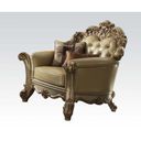 The appearance of Acme Vendome Chair in Gold Patina designed by ACME in the rustic / southwestern interior design. This gold patina piece of furniture was selected by 1StopBedrooms from Vendome Collection to add a touch of cosiness and style into your home. Sku: 53002. Material: Faux Leather. Key Features: Tufted.