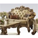 The appearance of Acme Vendome Loveseat in Gold Patina designed by ACME in the rustic / southwestern interior design. This gold patina piece of furniture was selected by 1StopBedrooms from Vendome Collection to add a touch of cosiness and style into your home. Sku: 53001. Material: Faux Leather. Key Features: Tufted.