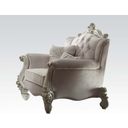 The appearance of Acme Versailles Chair in Ivory Velvet and Bone White 52107 designed by ACME in the rustic / southwestern interior design. This white piece of furniture was selected by 1StopBedrooms from Versailles Collection to add a touch of cosiness and style into your home. Sku: 52107. Material: Fabric. Key Features: Tufted.