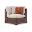 The appearance of Angel Island Outdoor Corner with Cushion In Brown and Beige designed by Signature Design by Ashley in the transitional interior design. This brown and beige piece of furniture was selected by 1StopBedrooms from Angel Island Collection to add a touch of cosiness and style into your home. Sku: P610-877. Material: Fabric.