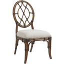 The appearance of Bali Hai Cedar Key Oval Back Side Chair In Sunset designed by Tommy Bahama in the transitional interior design. This sunset piece of furniture was selected by 1StopBedrooms from Bali Hai Collection to add a touch of cosiness and style into your home. Sku: 593-886-01. Material: Rattan.