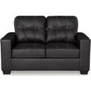The appearance of Barlin Mills Loveseat In Carbon designed by Signature Design by Ashley in the modern / contemporary interior design. This carbon piece of furniture  was selected by 1StopBedrooms from Barlin Mills Collection to add a touch of cosiness and style into your home. Sku: 1700435. Material: Faux Leather.