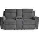 The appearance of Barnsana Power Reclining Loveseat with Console In Gravel designed by Signature Design by Ashley in the modern / contemporary interior design. This gravel piece of furniture was selected by 1StopBedrooms from Barnsana Collection to add a touch of cosiness and style into your home. Sku: 3320296. Material: Fabric.