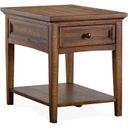 The appearance of Bay Creek Toasted Nutmeg Rectangle End Table designed by Magnussen in the transitional interior design. This brown piece of furniture  was selected by 1StopBedrooms from Bay Creek Collection to add a touch of cosiness and style into your home. Sku: T4398-03. Material: Pine Veneer.