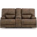 The appearance of Bealeaf Power Reclining Loveseat with Console In Earth designed by Signature Design by Ashley in the modern / contemporary interior design. This earth piece of furniture was selected by 1StopBedrooms from Bealeaf Collection to add a touch of cosiness and style into your home. Sku: NC9180218. Material: Faux Leather.