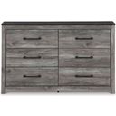 The appearance of Bronyan Dark Gray Dresser designed by Signature Design by Ashley in the modern / contemporary interior design. This dark gray piece of furniture was selected by 1StopBedrooms from Bronyan Collection to add a touch of cosiness and style into your home. Sku: B1290-31. Material: Wood.
