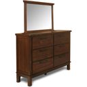 The appearance of Cagney Chestnut Dresser designed by New Classic in the modern / contemporary interior design. This brown piece of furniture was selected by 1StopBedrooms from Cagney Collection to add a touch of cosiness and style into your home. Sku: B594-050. Material: Wood.