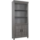 The appearance of Caraway Door Bookcase In Grey designed by Aspenhome in the country / farmhouse interior design. This grey piece of furniture  was selected by 1StopBedrooms from Caraway Collection to add a touch of cosiness and style into your home. Sku: I248-332-SLT-1. Material: Wood.