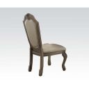 The appearance of Chateau De Ville Side Chair Set of 2 In Synthetic Leather and Antique White designed by ACME in the transitional interior design. This antique white piece of furniture was selected by 1StopBedrooms from Chateau De Ville Collection to add a touch of cosiness and style into your home. Sku: 64067A. Material: Wood.