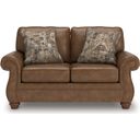 The appearance of Chatterton Loveseat In Earth designed by Signature Design by Ashley in the traditional interior design. This earth piece of furniture was selected by 1StopBedrooms from Chatterton Collection to add a touch of cosiness and style into your home. Sku: NC5590235. Material: Faux Leather.