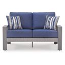 The appearance of Dillon Beach Outdoor Loveseat with Cushion In Gray and Blue designed by Signature Design by Ashley in the modern / contemporary interior design. This gray/blue piece of furniture was selected by 1StopBedrooms from Dillon Beach Collection to add a touch of cosiness and style into your home. Sku: P418-835. Material: Fabric.