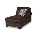 The appearance of Firescrest Right-Arm Facing Corner Chaise In Chocolate designed by Signature Design by Ashley in the modern / contemporary interior design. This chocolate piece of furniture  was selected by 1StopBedrooms from Firescrest Collection to add a touch of cosiness and style into your home. Sku: NC3560317. Material: Fabric.