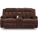 The appearance of Free Wake Power Reclining Loveseat with Console In Chocolate designed by Signature Design by Ashley in the modern / contemporary interior design. This chocolate piece of furniture was selected by 1StopBedrooms from Free Wake Collection to add a touch of cosiness and style into your home. Sku: NC2140696. Material: Fabric.