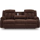 The appearance of Free Wake Power Reclining Sofa with Drop Down Table In Chocolate designed by Signature Design by Ashley in the modern / contemporary interior design. This chocolate piece of furniture was selected by 1StopBedrooms from Free Wake Collection to add a touch of cosiness and style into your home. Sku: NC2140699. Material: Fabric.