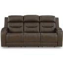 The appearance of Guru Power Reclining Sofa with Audio Seating In Brown designed by Signature Design by Ashley in the modern / contemporary interior design. This brown piece of furniture was selected by 1StopBedrooms from Guru Collection to add a touch of cosiness and style into your home. Sku: NCU1160215A. Material: Leather Match.