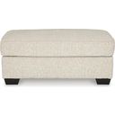 The appearance of Heartcort Ottoman In Quartz designed by Signature Design by Ashley in the modern / contemporary interior design. This quartz piece of furniture  was selected by 1StopBedrooms from Heartcort Collection to add a touch of cosiness and style into your home. Sku: 4460414. Material: Fabric.
