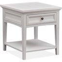 The appearance of Heron Cove Chalk White Rectangle End Table designed by Magnussen in the transitional interior design. This white piece of furniture was selected by 1StopBedrooms from Heron Cove Collection to add a touch of cosiness and style into your home. Sku: T4400-03. Material: Pine Veneer.