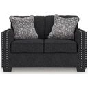 The appearance of Jasmine Peaks Loveseat In Coal designed by Signature Design by Ashley in the modern / contemporary interior design. This coal piece of furniture  was selected by 1StopBedrooms from Jasmine Peaks Collection to add a touch of cosiness and style into your home. Sku: 2890435. Material: Polyester.