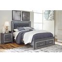 The appearance of Lodanna Gray Queen Upholstered Storage Panel Bed designed by Signature Design by Ashley in the modern / contemporary interior design. This gray piece of furniture  was selected by 1StopBedrooms from Lodanna Collection to add a touch of cosiness and style into your home. Sku: B214-54S;B214-57;B214-95;B100-13. Bed Type: Panel Bed. Material: Fabric. Bed Size: Queen.