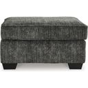 The appearance of Lonoke Ottoman In Gunmetal designed by Signature Design by Ashley in the modern / contemporary interior design. This gunmetal piece of furniture  was selected by 1StopBedrooms from Lonoke Collection to add a touch of cosiness and style into your home. Sku: 5050414. Material: Polyester.