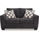 The appearance of Loreo Loveseat In Ebony designed by Signature Design by Ashley in the modern / contemporary interior design. This ebony piece of furniture was selected by 1StopBedrooms from Loreo Collection to add a touch of cosiness and style into your home. Sku: 6310135. Material: Polyester.