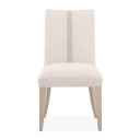 The appearance of Lotus Bay Dining Side Chair Set of 2 In Sand designed by Michael Amini in the transitional interior design. This sand piece of furniture  was selected by 1StopBedrooms from Lotus Bay Collection to add a touch of cosiness and style into your home. Sku: 9030003-138. Material: Solid Wood.