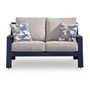 The appearance of Mabry Shores Outdoor Loveseat with Cushion In Blue designed by Signature Design by Ashley in the modern / contemporary interior design. This blue piece of furniture was selected by 1StopBedrooms from Mabry Shores Collection to add a touch of cosiness and style into your home. Sku: P587-835. Material: Fabric.