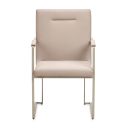 The appearance of Marin Dining Arm Chair Set of 2 In Greige designed by Michael Amini in the modern / contemporary interior design. This greige piece of furniture  was selected by 1StopBedrooms from Marin Collection to add a touch of cosiness and style into your home. Sku: NKI-MRIN004-139. Material: Solid Wood.