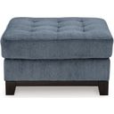 The appearance of Maxon Place Oversized Accent Ottoman In Navy designed by Signature Design by Ashley in the modern / contemporary interior design. This navy piece of furniture was selected by 1StopBedrooms from Maxon Place Collection to add a touch of cosiness and style into your home. Sku: 3300308. Material: Fabric.