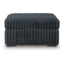 The appearance of Midnight-Madness Oversized Accent Ottoman In Gunmetal designed by Signature Design by Ashley in the modern / contemporary interior design. This gunmetal piece of furniture  was selected by 1StopBedrooms from Midnight-Madness Collection to add a touch of cosiness and style into your home. Sku: 9810508. Material: Polyester.