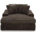 The appearance of Midnight-Madness Oversized Chaise In Chocolate designed by Signature Design by Ashley in the modern / contemporary interior design. This chocolate piece of furniture was selected by 1StopBedrooms from Midnight-Madness Collection to add a touch of cosiness and style into your home. Sku: 9810415. Material: Polyester.