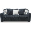 The appearance of Midnight-Madness Sofa In Gunmetal designed by Signature Design by Ashley in the modern / contemporary interior design. This gunmetal piece of furniture  was selected by 1StopBedrooms from Midnight-Madness Collection to add a touch of cosiness and style into your home. Sku: 9810538. Material: Polyester.