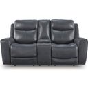 The appearance of Mighty Moves Power Reclining Loveseat In Admiral designed by Signature Design by Ashley in the modern / contemporary interior design. This admiral piece of furniture was selected by 1StopBedrooms from Mighty Moves Collection to add a touch of cosiness and style into your home. Sku: NCU1210018. Material: Leather Match.