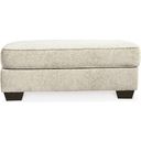 The appearance of Monaghan Ottoman In Sandstone designed by Signature Design by Ashley in the transitional interior design. This sandstone piece of furniture  was selected by 1StopBedrooms from Monaghan Collection to add a touch of cosiness and style into your home. Sku: 9620514. Material: Fabric.
