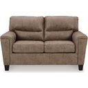 The appearance of Navi Loveseat In Fossil designed by Signature Design by Ashley in the modern / contemporary interior design. This fossil piece of furniture  was selected by 1StopBedrooms from Navi Collection to add a touch of cosiness and style into your home. Sku: 9400435. Material: Faux Leather.