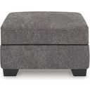 The appearance of Olten Ottoman In Graphite designed by Signature Design by Ashley in the modern / contemporary interior design. This graphite piece of furniture  was selected by 1StopBedrooms from Olten Collection to add a touch of cosiness and style into your home. Sku: 3130514. Material: Polyester.