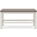 The appearance of Robbinsdale 49 Inch Counter Height Dining Bench In Antique White designed by Signature Design by Ashley in the transitional interior design. This antique white piece of furniture  was selected by 1StopBedrooms from Robbinsdale Collection to add a touch of cosiness and style into your home. Sku: D642-09. Material: Fabric.